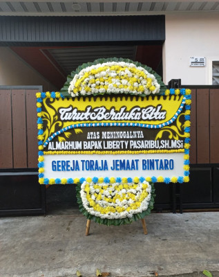 Papan Bunga Duka di Koja